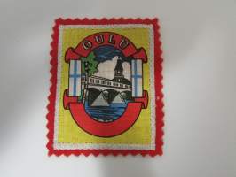 Oulu -kangasmerkki / matkailumerkki / hihamerkki / badge -pohjaväri punainen