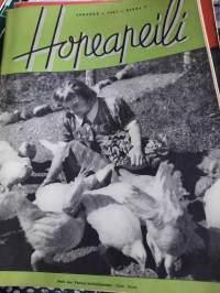 Hopeapeili 1942 lokakuu Lea Vannas hoidokkeineen kannessa, musta puku Kalevala-korujen muunnelmina, suomalaisen työtyön tie