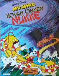 Walt Disneyn Klassikot - Aku Ankka kovan onnen nukke. (Sarjakuvat)