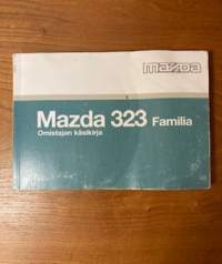 Mazda 323  Familia - Omistajan käsikirja