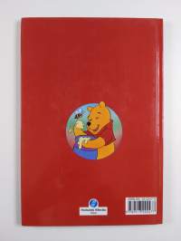 Nalle Puh ja hunajapuu : Disneyn satulukemisto
