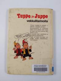 Tuppe ja Juppe auttavat norsua