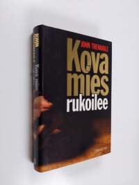 Kova mies rukoilee