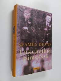 Lukuhetkiä pimeässä