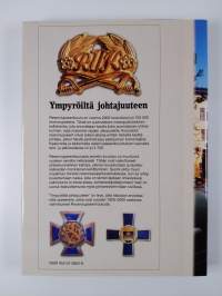 Ympyröiltä johtajuuteen : Reserviupseerikoulun 80-vuotisjuhlakirja 1920-2000