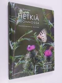 Hetkiä luonnossa : vuodenkierto kuvina = Wildlife moments : the four seasons in photographs