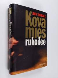 Kova mies rukoilee