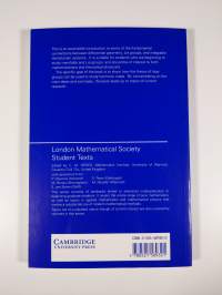 Harmonic Maps, Loop Groups, and Integrable Systems (ERINOMAINEN)
