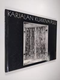 Karjalan kukkiva puu : Eva Ryynänen ja hänen taiteensa = The flowering tree of Karelia : Eva Ryynänen and her art (signeerattu)