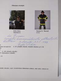 Kansainvälinen palokuntakirja 1 (signeerattu)