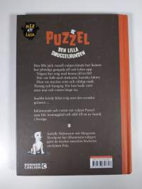 Puzzel : den lilla smuggelhunden (ERINOMAINEN)