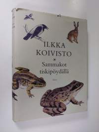 Sammakot tiskipöydällä