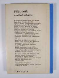 Pikku-Niilo matkalaukussa