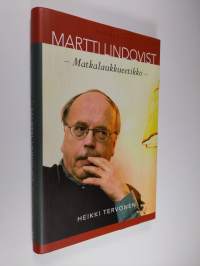 Martti Lindqvist : matkalaukkueetikko (ERINOMAINEN)