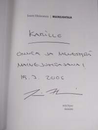 Mainejohtaja (signeerattu)