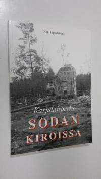 Karjalaisperhe sodan kiroissa