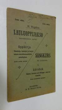 Lauluoppijakso kansakouluja varten = Sångkurs för folkskolan 1, 2:nen vihko, Oppikirja : skaaloja, kaavoja ja harjoituksia kahdeksassatoista sävellajissa = Lärobo...