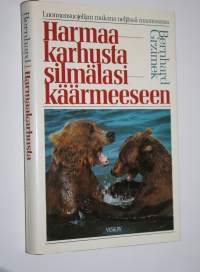 Harmaakarhusta silmälasikäärmeeseen : luonnonsuojelijan mukana neljässä maanosassa