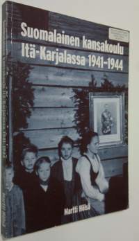 Suomalainen kansakoulu Itä-Karjalassa 1941-1944 (signeerattu) : Itä-Karjalan sotilashallintoesikunnan kansakoululaitos