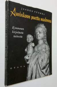 Aurinkoon puettu madonna : kymmenen kirjoitusta taiteesta