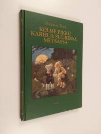 Kolme pikku karhua suuressa metsässä