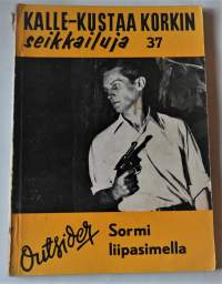 Kalle-Kustaa Korkin Seikkailuja 37	Sormi liipasimella