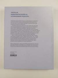 Suomalaisten hyvinvointia rakentamassa : Teollisuuden Keskusliiton historia (signeerattu, tekijän omiste)