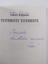 Totisesti totisesti (signeerattu, tekijän omiste)