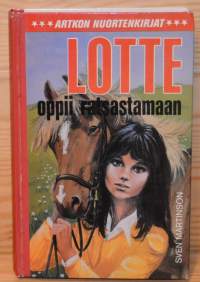 Lotte oppii ratsastamaan