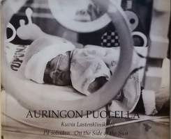 Auringon puolella. (Kuvateos, Lastenklinikka, valokuvataide)