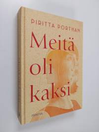 Meitä oli kaksi : romaani