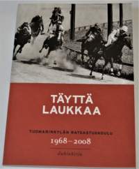 Täyttä laukkaa Tuomarinkylän ratsastuskoulu 1968-2008 Juhlakirja