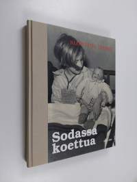 Sodassa koettua : Haavoitettu lapsuus