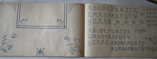 Nya monogram och mönster i vitbroderi och korsstygn -ristipistomalleja