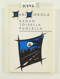 Kadun toisella puolella