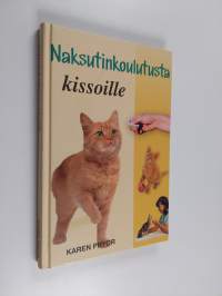 Naksutinkoulutusta kissoille