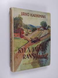 Kylä järven rannalla