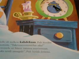 nalle puh  kellon ympäri.