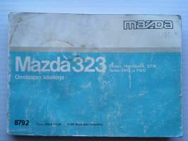 Käyttöohjekirja (Hansikaslokerokirja) - Mazda 323 - Sedan, Hatchback, STW,Turbo 4WD ja FDW