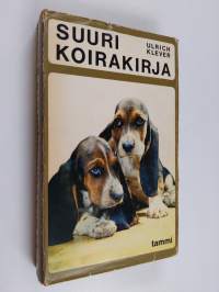 Suuri koirakirja - käsikirja koiranystäville ; 184 piirrosta, yksi- ja monivärisiä valokuvia