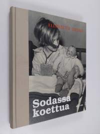 Sodassa koettua : Haavoitettu lapsuus