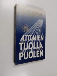 Atomien tuolla puolen : Wolfgang Paulin ajatuksia hengestä ja aineesta, todellisuuden luonteesta ja pahan asemasta maailmassa