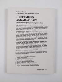 Johtamisen ankarat lait : 70 periaatetta johtajan hampaankoloon