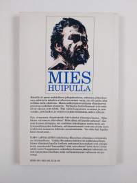 Mies huipulla