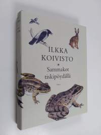 Sammakot tiskipöydällä (ERINOMAINEN)