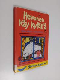 Hevonen käy kylässä