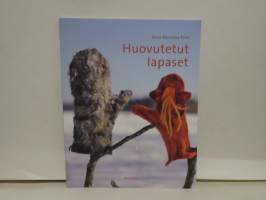 Huovutetut lapaset