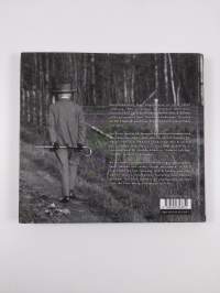 Jean Sibelius kodissaan = Jean Sibelius i sitt hem = Jean Sibelius at Home