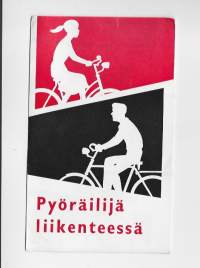 Pyöräilijä liikenteessä