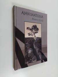 Ajan saatossa : runoja